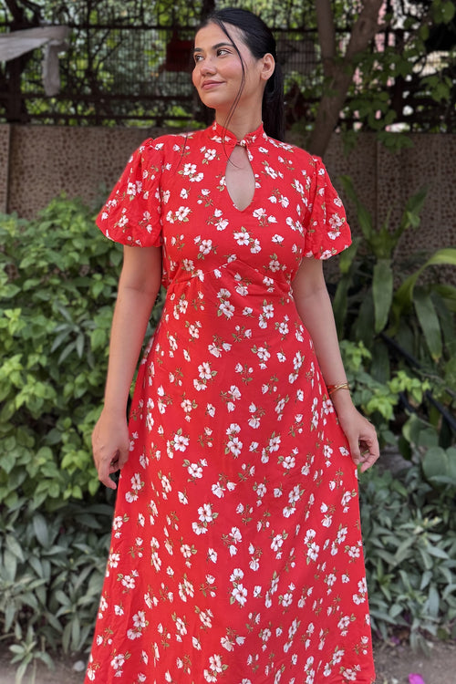 rooshy Sakura Muse Dress - model smiling in red floral puff sleeve dress showing neckline and waist detail