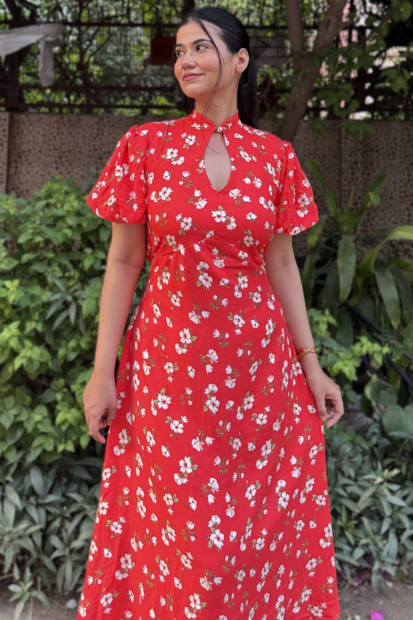 rooshy Sakura Muse Dress - model smiling in red floral puff sleeve dress showing neckline and waist detail