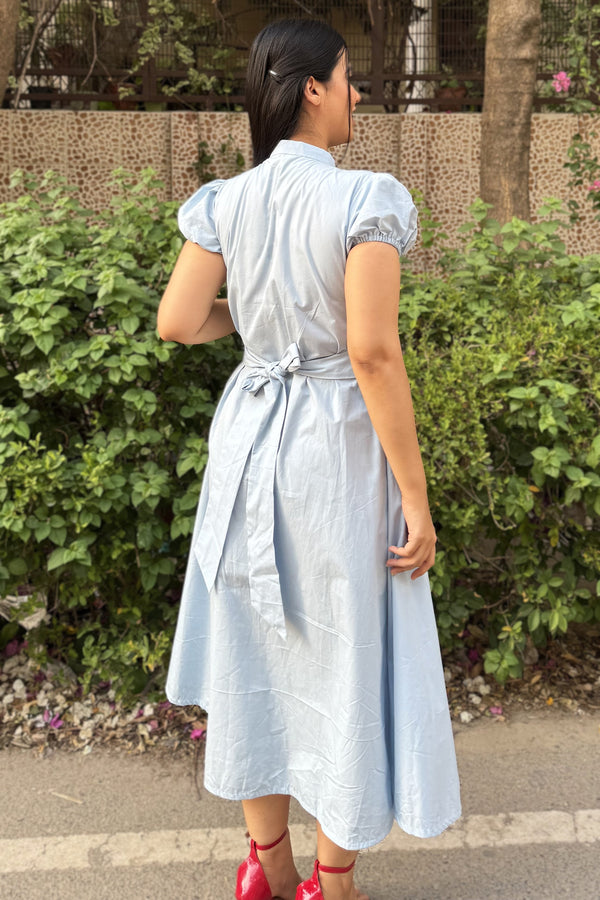 rooshy Blue Elan Collar Dress - back view showing bow waist tie on sky blue puff sleeve midi dress