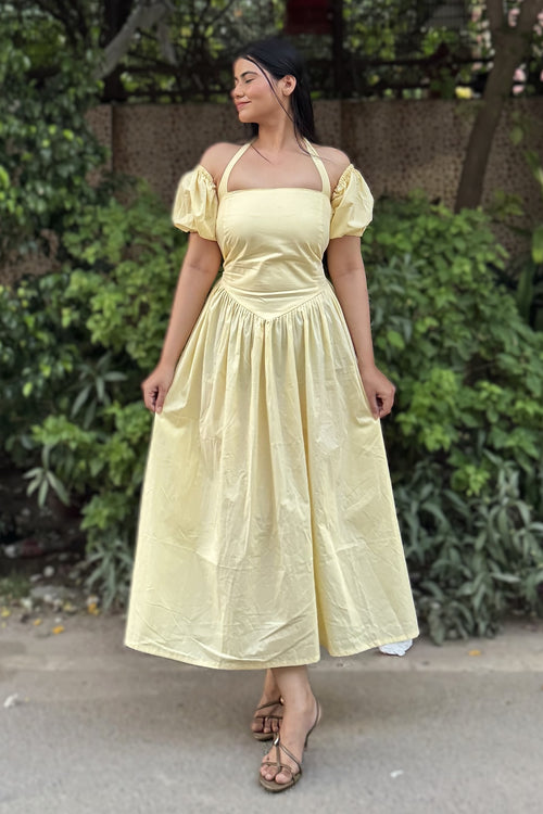 rooshy Butter Babe Corset Dress - off-shoulder puff sleeve yellow corset dress model looking sideways