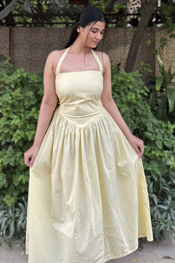 rooshy Butter Babe Corset Dress - close-up of model holding flared skirt sides showing corset waist