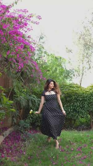 Rooshy knot tie neck short sleeves snatched waist polka dot black dress